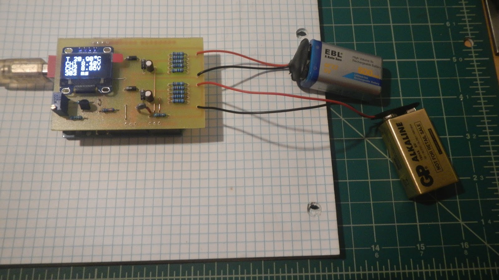 Two-channel voltmeter with thermometer on an Arduino Uno, connected to two 9 V batteries